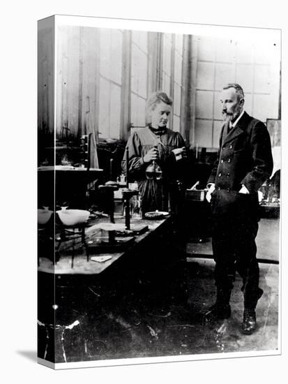 Pierre (1859-1906) and Marie Curie (1867-1934) in their Laboratory, c.1900-Valerian Gribayedoff-Stretched Canvas