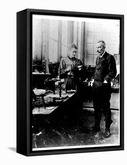 Pierre (1859-1906) and Marie Curie (1867-1934) in their Laboratory, c.1900-Valerian Gribayedoff-Framed Stretched Canvas