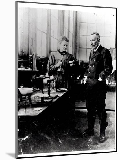 Pierre (1859-1906) and Marie Curie (1867-1934) in their Laboratory, c.1900-Valerian Gribayedoff-Mounted Giclee Print