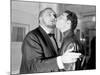 Pierre and Claude Brasseur Kissing-Marcel Begoin-Mounted Photographic Print