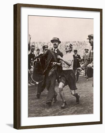 Pietri Dorando of Italy Wins the Marathon from Windsor to the Olympic Stadium-null-Framed Photographic Print