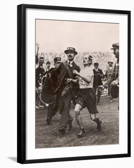 Pietri Dorando of Italy Wins the Marathon from Windsor to the Olympic Stadium-null-Framed Photographic Print