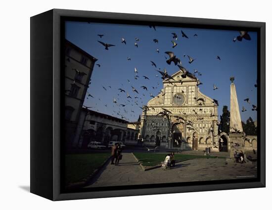 Pigeons in Flight in the Piazza Santa Maria Novella, Florence, Tuscany, Italy-Robert Francis-Framed Stretched Canvas