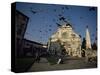 Pigeons in Flight in the Piazza Santa Maria Novella, Florence, Tuscany, Italy-Robert Francis-Stretched Canvas