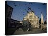 Pigeons in Flight in the Piazza Santa Maria Novella, Florence, Tuscany, Italy-Robert Francis-Stretched Canvas