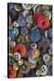 Pile of antique buttons-Mallorie Ostrowitz-Stretched Canvas