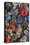 Pile of antique buttons-Mallorie Ostrowitz-Stretched Canvas