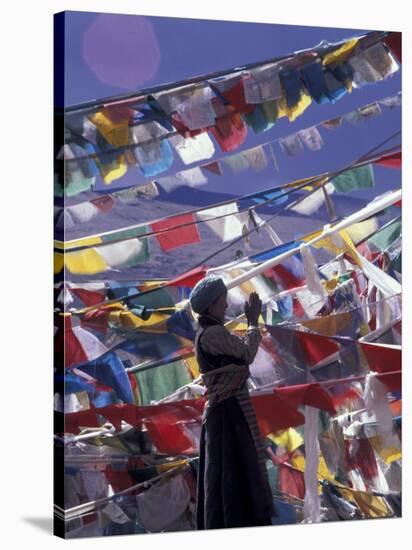 Pilgrim Praying Among Flags, Tibet-Keren Su-Stretched Canvas