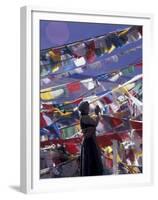 Pilgrim Praying Among Flags, Tibet-Keren Su-Framed Premium Photographic Print