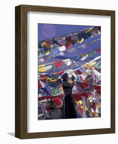 Pilgrim Praying Among Flags, Tibet-Keren Su-Framed Photographic Print