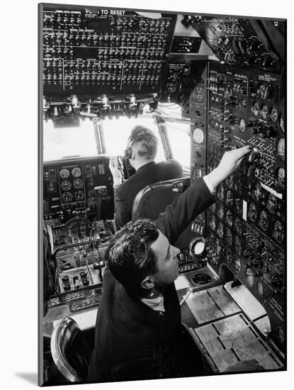 Pilot in a Cockpit-null-Mounted Giclee Print