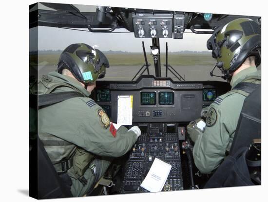 Pilots Inside the Cockpit of a Royal Air Force Merlin Helicopter at RAF Lyneham-Stocktrek Images-Stretched Canvas