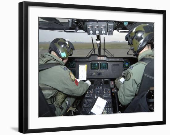 Pilots Inside the Cockpit of a Royal Air Force Merlin Helicopter at RAF Lyneham-Stocktrek Images-Framed Photographic Print