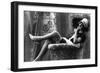 Pin-Up Girl in French Maid Outfit Smoking and Sitting-Lantern Press-Framed Art Print