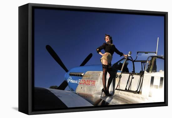Pin-Up Girl Standing on the Wing of a P-51 Mustang-null-Framed Stretched Canvas