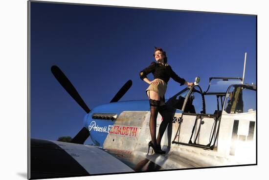 Pin-Up Girl Standing on the Wing of a P-51 Mustang-null-Mounted Photographic Print
