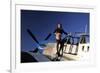 Pin-Up Girl Standing on the Wing of a P-51 Mustang-null-Framed Photographic Print