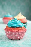 Three Different Colors Cupcakes On A Wooden Table, Blue, Yellow And Pink-pink candy-Art Print