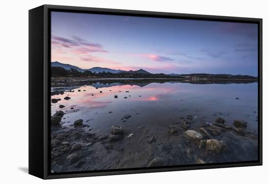 Pink clouds at sunset are reflected in the blue sea, Villasimius, Sardinia, Italy, Mediterranean-Roberto Moiola-Framed Stretched Canvas