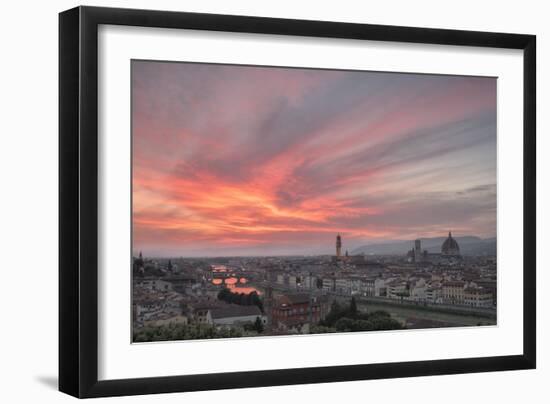 Pink clouds at sunset frame the city of Florence crossed by Arno River seen from Piazzale Michelang-Roberto Moiola-Framed Photographic Print