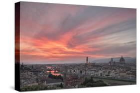 Pink clouds at sunset frame the city of Florence crossed by Arno River seen from Piazzale Michelang-Roberto Moiola-Stretched Canvas