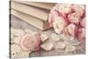 Pink Roses and Old Books on Wooden Desk-egal-Stretched Canvas