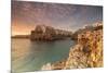 Pink sunrise on the turquoise sea framed by old town perched on the rocks, Polignano a Mare, Provin-Roberto Moiola-Mounted Photographic Print