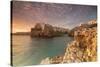 Pink sunrise on the turquoise sea framed by old town perched on the rocks, Polignano a Mare, Provin-Roberto Moiola-Stretched Canvas