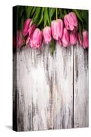 Pink Tulips over Wooden Table-oksix-Stretched Canvas