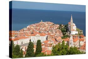Piran, Primorska, Slovenia. Overeall view of the town and of St. George's cathedral from the Tow...-null-Stretched Canvas