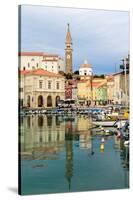 Piran, Primorska, Slovenia. View across harbour to Tartinijev trg (or square) and the spire of S...-null-Stretched Canvas