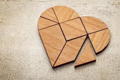 Heart Version of Tangram, a Traditional Chinese Puzzle Game Made of Different Wood Parts to Build A