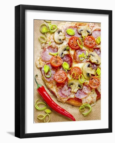 Pizza with Salami, Mushrooms, Tomatoes, Leek, Mozzarella and Chillis-Ira Leoni-Framed Photographic Print