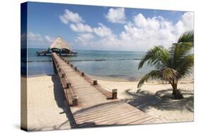 Placencia, Belize. Roberts Grove Resort, Pier Leads from Beach to Bar-Trish Drury-Stretched Canvas