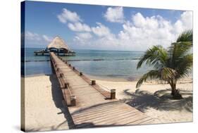 Placencia, Belize. Roberts Grove Resort, Pier Leads from Beach to Bar-Trish Drury-Stretched Canvas