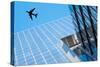 Plane Flying over Modern Buildings of New York City-magann-Stretched Canvas