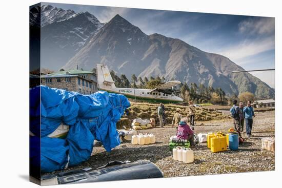 Plane taking off from Lukla airport, Lukla, Nepal.-Lee Klopfer-Stretched Canvas