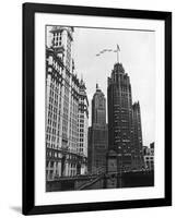 Planes Fly over Buildings in Chicago-null-Framed Photographic Print