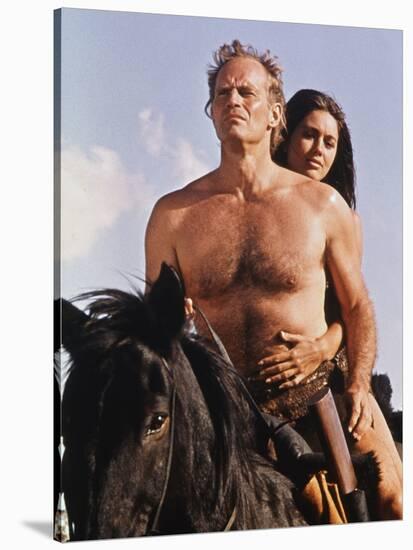 PLANET OF THE APES, 1968 directed by FRANKLYN J. SCHAFFNER Charlton Heston / Linda Harrison (photo)-null-Stretched Canvas