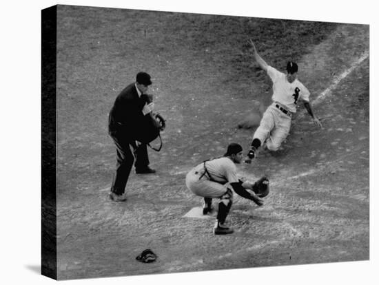 Player Attempting to Slide Home During an Unidentified Baseball Game-null-Stretched Canvas