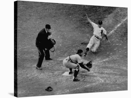 Player Attempting to Slide Home During an Unidentified Baseball Game-null-Stretched Canvas