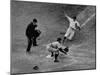 Player Attempting to Slide Home During an Unidentified Baseball Game-null-Mounted Premium Photographic Print