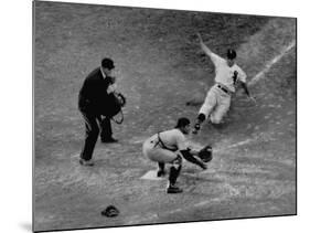 Player Attempting to Slide Home During an Unidentified Baseball Game-null-Mounted Photographic Print