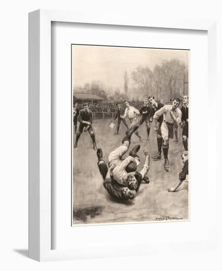 Player Making a Tackle in a Rugby Game-Ernest Prater-Framed Art Print