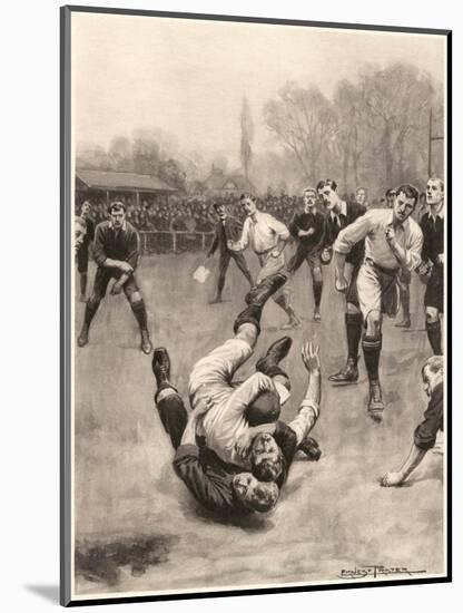 Player Making a Tackle in a Rugby Game-Ernest Prater-Mounted Art Print
