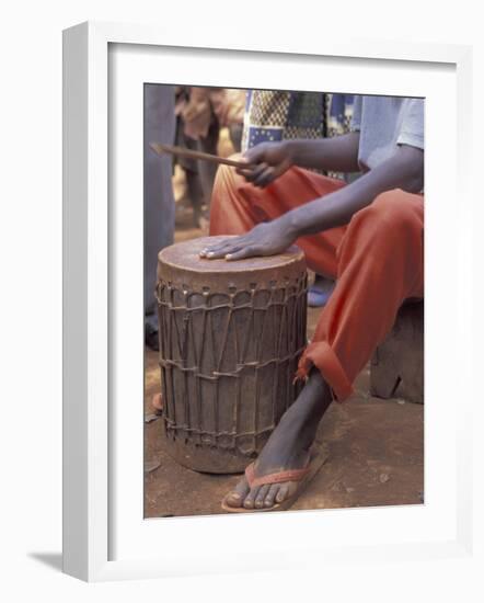 Playing a Congolese Drum in a Congolese Refugee Camp, Tanzania-Kristin Mosher-Framed Photographic Print