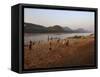 Playing Football on the Banks of the Mekong River, Luang Prabang, Laos, Indochina-Andrew Mcconnell-Framed Stretched Canvas