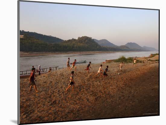 Playing Football on the Banks of the Mekong River, Luang Prabang, Laos, Indochina-Andrew Mcconnell-Mounted Photographic Print