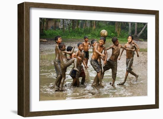 Playing Football-Angela Muliani Hartojo-Framed Photographic Print