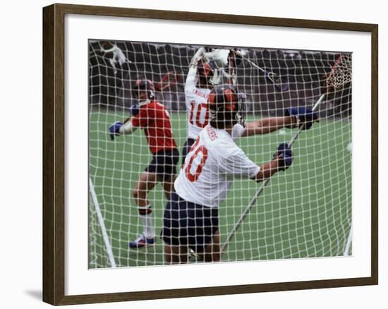 Playing Lacrosse-null-Framed Photographic Print